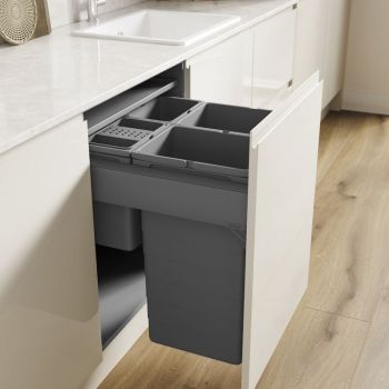 Blum Merivobox Ninka 600mm integrated pull-out kitchen bin with 4 compartments (2x32L  2x8L) featuring soft-close mechanism and grey finish  installed in white cabinetry with drawer open