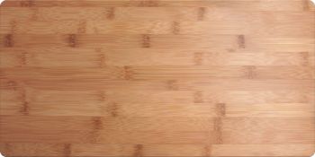 Schock bamboo chopping board in natural finish displaying fine grain texture and bamboo node patterns suitable for Schock Mono kitchen sinks