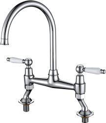 The1810 Moulins Classic Bridge Mixer kitchen tap with arched brass spout  dual ceramic handle sets  and swivel function for sink coverage